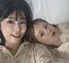 Television personality Sayuri Fujita, left, with her son, Zen [SCREEN CAPTURE]