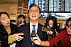 Minister of Oceans and Fisheries Chun Jae-soo takes questions from reporters at Incheon International Airport on Dec. 11. [YONHAP]