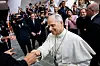 Pope Leo XIV shakes hand during an audience with representatives of the media in Paul VI hall at the Vatican, May 12, 2025. [REUTERS/YONHAP]