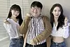 HYBE founder Bang Si-hyuk, in the middle, posing with Le Sserafim members Kim Chae-won and Sakura for a photo. [INSTAGRAM]