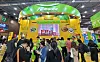Visitors at SIAL Paris taste Pulmuone's products at the plant-based foods company's booth at SIAL Paris. [PULMUONE]