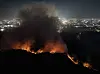 Mount Hamji in Nogok-dong, Daegu, is on fire on April 28 evening. [YONHAP]
