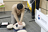 Lee Chang-hee, a professor of emergency medical services at Namseoul University, demonstrates how to attach automated external defibrillator pads without removing a woman’s undergarments, in line with the revised cardiopulmonary resuscitation guidelines, on Jan. 29. [YONHAP]