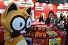 Nongshim's raccoon dog mascot for its Neoguri ramyeon greets visitors at the ramyeon manufacturer's booth at the Korea Expo 2024 in Paris in May. [NEWS1]
