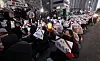 People call for the impeachment of President Yoon Suk Yeol at a rally held in front of the ruling People Power Party's office in Daegu on Wednesday. [YONHAP]
