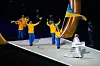 Anastasia Kucherova carries the sign as she leads out athletes from the Ukraine as they enter the arena at the Olympic opening ceremony at the 2026 Winter Olympics, in Milan, Italy, on Feb. 6. [AP/YONHAP]