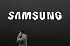 A person walks by a logo of Samsung Electronics at an exhibition hall for the Asia-Pacific Economic Cooperation (APEC) in Gyeongju, North Gyeongsang, on Oct. 30. [AP/YONHAP]