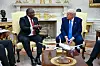 U.S. President Donald Trump meets with South African President Cyril Ramaphosa in the Oval Office of the White House in Washington on May 21. South African President Cyril Ramaphosa meets Donald Trump on Wednesday amid tensions over Washington's resettlement of white Afrikaners that the U.S. president claims are the victims of ″genocide.″ [AFP/YONHAP]