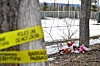Flowers and toys lie on the ground near the site of a mass shooting at a high school in the town of Tumbler Ridge, British Columbia, Canada, on Feb. 11. [REUTERS/YONHAP]