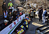 Officials from Bukhansan National Park and members of a mountain safety advocacy group conduct a wildfire prevention campaign along a hiking trail in Bukhansan National Park, Eunpyeong District, northern Seoul, on March 30. [YONHAP]