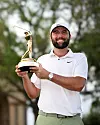 Scottie Scheffler poses with the trophy after winning The Players Championship at TPC Sawgrass on March 17, 2024 in Ponte Vedra Beach, Florida. [GETTY IMAGES]