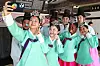 International students wearing hanbok, or Korean traditional dress, take selfies during a Coming of Age Day event held at a traditional house in Yeungnam University in Gyeongsan, North Gyeongsang, on Friday. The Coming of Age Day fell on Monday this year. [NEWS1]