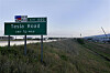 A highway sign for Tesla Road is seen near the Tesla Giga Texas factory on May 17, 2022, in Austin, Texas. [GETTY IMAGES]