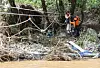 A camper is rescued by fire authorities as a landslide triggered by heavy rainfall swept the region in Mail-ri, Jojong-myeon, Gapyeong County, Gyeonggi, on July 20. [YONHAP]