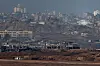 Israeli soldiers operate in Gaza, as seen from the Israeli side of the Israel-Gaza border on July 9. [REUTERS/YONHAP]