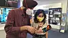 Customers in India look at Samsung's new Galaxy Z Flip at an exhibition hall in Gurugram, India. [SAMSUNG ELECTRONICS]