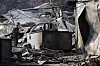 Wildfire victims and their families check the damage in a village in Andong, North Gyeongsang, on March 29. [YONHAP]