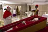 Vatican Secretary of State Cardinal Pietro Parolin, left, prays in front of the body of Pope Francis laid out in state inside his private chapel at the Vatican on April 21. [AP/YONHAP]