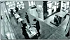 A screen capture of surveillance camera footage that allegedly shows an NIS handler purchasing a designer handbag for Terry in 2021. [UNITED STATES DISTRICT COURT SOUTHERN DISTRICT OF NEW YORK]