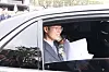 Constitutional Court Acting Chief Justice Moon Hyung-bae leaves the court building in Jongno District, central Seoul, after his leaving ceremony on April 18. [YONHAP]