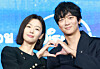 Actors Jun Ji-hyun, left, and Gang Dong-won from Disney+'s spy thriller ″Tempest″ pose for photos during the series' press conference at the Four Seasons Hotel in Jongno District, central Seoul, on Sept. 2. [NEWS1]