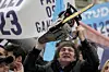 Argentinian President Javier Milei brandishes a chainsaw during a campaign event in La Plata, Argentina, on Sept. 12, 2023. Milei has used the chainsaw throughout his campaign to symbolize how he will slash government spending and waste. [AP/YONHAP] 금지.〉