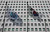 The Korean national flag, right, and a banner with the logo of the state prosecution service flutter outside the Supreme Prosecutors' Office in Seocho District, southern Seoul, on Jan. 26. [NEWS1]