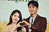 Actors IU, left, and Park Bo-gum pose for photo during a press conference for upcoming Netflix series ″When Life Gives You Tangerines″ held at Conrad Seoul in Yeouido, western Seoul, on March 5. [YONHAP]