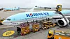 Workers clean Korean Air's Boeing 777-300ER carrier at the airlines' hangar in Incheon International Airport in April. [NEWS1]