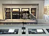 Experts fix damaged artifacts and artworks in the Kansong Art Museum Daegu's Open Conservation Studio on Tuesday. Visitors are allowed to interact with the conservators via the microphone on set. [SHIN MIN-HEE]