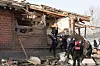 Forensic officials conduct an inspection at a village in Pocheon, which was damaged after an accidental release of bombs by the South Korean Air Force, on March 7. [YONHAP]