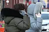 People in puffers walk on the road in Daegu on Wednesday as an arctic cold wave grips the country. [NEWS1]