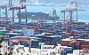 Shipping containers are stacked at Busan Port on April 30. [YONHAP]
