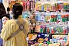 A parent looks at educational material for children at a trade show in Coex in Gangnam District, southern Seoul, on July 10. [NEWS1]