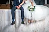 An image of a bride and groom [SHUTTERSTOCK]