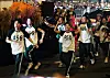 A parade to celebrate the grand finale of Netflix's global hit series ″Squid Game″ (2021-) was held in central Seoul on June 28. The image features participants wearing numbered uniforms as shown in the series. [NEWS1]