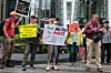 Demonstrators chant in protest at a ″Crappy Birthday Elon Protest″ outside a Tesla showroom on CEO Elon Musk's birthday in Boston, Massachusetts on June 28. [REUTERS/YONHAP]