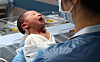 A nurse cares for a newborn at a hospital in Goyang, just west of Seoul, on Dec. 26, 2025. [YONHAP]