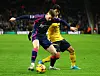 Wolverhampton Wanderers' Hwang Hee-chan, right, vies for the ball during a Premier League match against Nottingham Forest at Molineux Stadium in Wolverhampton, England on Jan. 6. [REUTERS/YONHAP]