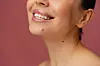 A close-up of a woman’s moles, a feature often interpreted with specific meanings in Korean physiognomy. [GETTY IMAGES BANK]