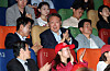 Former President Yoon Suk Yeol claps after a screening of the documentary film ″Election Fraud: A Work of God?″ at Megabox Dongdaemun in Seoul on May 21. [JOONGANG ILBO]