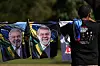 A vendor displays for sale T-shirts featuring Brazil's President Luiz Inacio Lula da Silva outside the venue where Lula attended a presentation of the federal government's achievements of the past two years, in Brasilia, Brazil, on April 3. [AP/YONHAP]