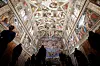 Visitors admire the Sistine Chapel inside the Vatican Museums on the occasion of the museum's reopening, in Rome on May 3, 2021. [AP/YONHAP]