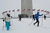 People use cross-country skis and snowshoes in front of the Washington Monument during snowfall, as a major winter storm spreads across a large swath of the United States, in Washington, Jan. 25. [REUTERS/YONHAP]