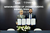 Hyundai Rotem Executive Vice President Lee Jeong-yeob, left, head of the Defense Solution Business Division, and Mike Hanlin, senior director of international strategy & business development at Shield AI, pose for a photo after signing a memorandum of understanding on a partnership for AI-based defense technologies during the 2025 Seoul International Aerospace & Defense Exhibition (ADEX) in Goyang, Gyeonggi, on Oct. 24. [HYUNDAI ROTEM]