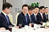 President Lee Jae Myung, second from left, speaks at a luncheon meeting with research center heads at security firms at the Yongsan presidential office in central Seoul on Sept. 18. [JOINT PRESS CORPS]