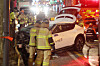 A traffic accident involving a taxi and two other vehicles occurred on a road in front of Jonggak Station in Jongno District, central Seoul, on Jan. 2, which ultimately resulted in several casualties. The taxi sits stationary after crashing into a guardrail on a sidewalk. [YONHAP]