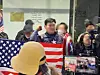 A man wearing Captain America's iconic costume shows up at the National Human Rights Commission of Korea's building in Jung District, central Seoul, on Feb. 10. [YONHAP]