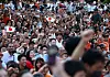 Sanseito party supporters raise their fists during the Sanseito's election campaign tour, on the last day of campaigning for the July 20 upper house election, at Shiba Park in Tokyo, Japan on July 19. [REUTERS/YONHAP]