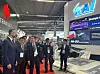 Polish Deputy Prime Minister and Minister of National Defence Władysław Kosiniak-Kamysz, left, listens as KAI Senior Executive Vice President Cha Jae-byoung, third from left, explains systems at the KAI booth during MSPO 2025 in Kielce, Poland, on Sept. 3. [KAI]